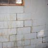 A cracked foundation wall near a window in a Mount Vernon home