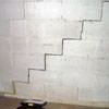 A diagonal stair step crack along the foundation wall of a Lewis Center home