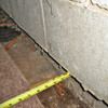 Foundation wall separating from the floor in Etna home