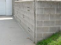 A retaining wall separating from the adjoining walls in Powell