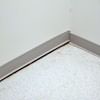 A partition wall separating from the floor in a Portsmouth home.