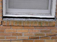 A window sill cracking and separating from the foundation wall in a Pickerington home.