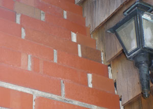 a repaired chimney in Grove City that had shown serious foundation damage and was repaired with a helical pier system.