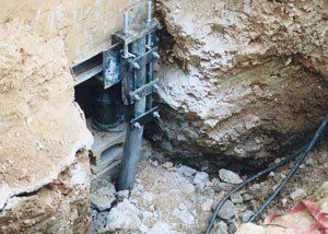 a bent, failed foundation push pier installed in Chillicothe.