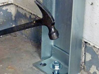 Mounting a foundation channel anchor installation to the floor in Reynoldsburg.