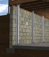I-beam foundation wall supports installed in a Bellefontaine basement.