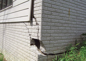 A severely damaged foundation wall in Galloway