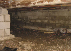 Rotting, decaying crawl space wood damaged over time in Waverly