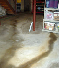 Flooding entering a basement through a floor crack in Blacklick
