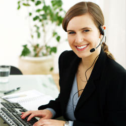 A disaster restoration customer service expert in Newark manning the phones