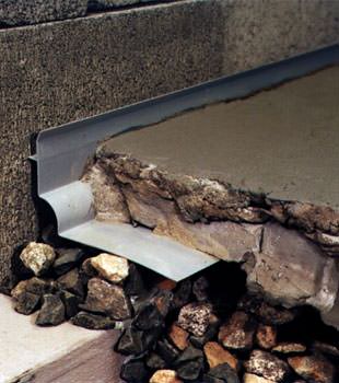a custom designed basement drain system for thin basement floors in Pataskala.