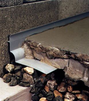 a custom designed basement drain system for thin basement floors in Mount Vernon.