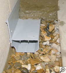 A no-clog basement french drain system installed in Hilliard