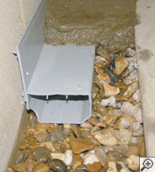 A no-clog basement french drain system installed in Marysville
