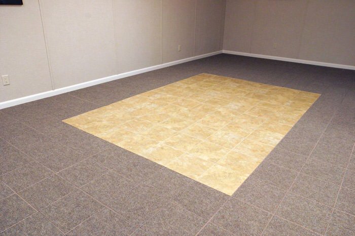 tiled and carpeted basement flooring installed in a Dublin home