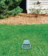 A buried gutter drain downspout extension installed in a Marietta home