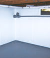 Westerville, OH wet basement wall covering that tucks into a perimeter drainage system